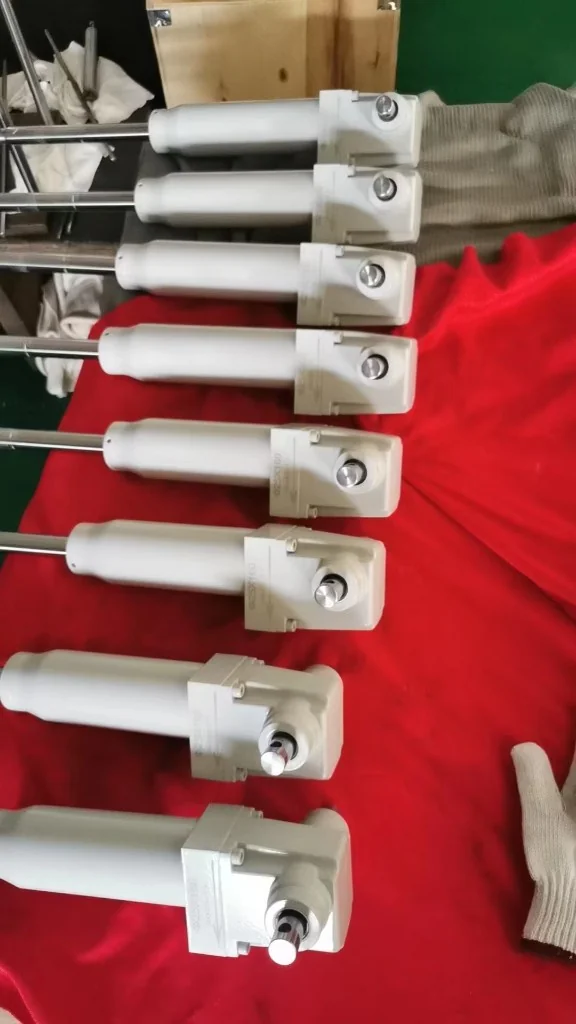 Batch of SLA-HP250 hydraulic actuators arranged for production or quality inspection